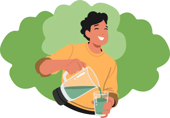 Une personne se verse du jus de couleur verte en souriant largement.