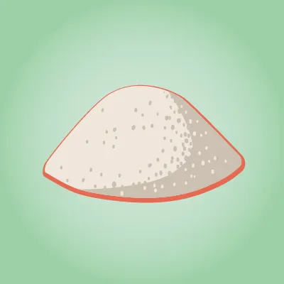 Un petit tas de sucre blanc granulé.